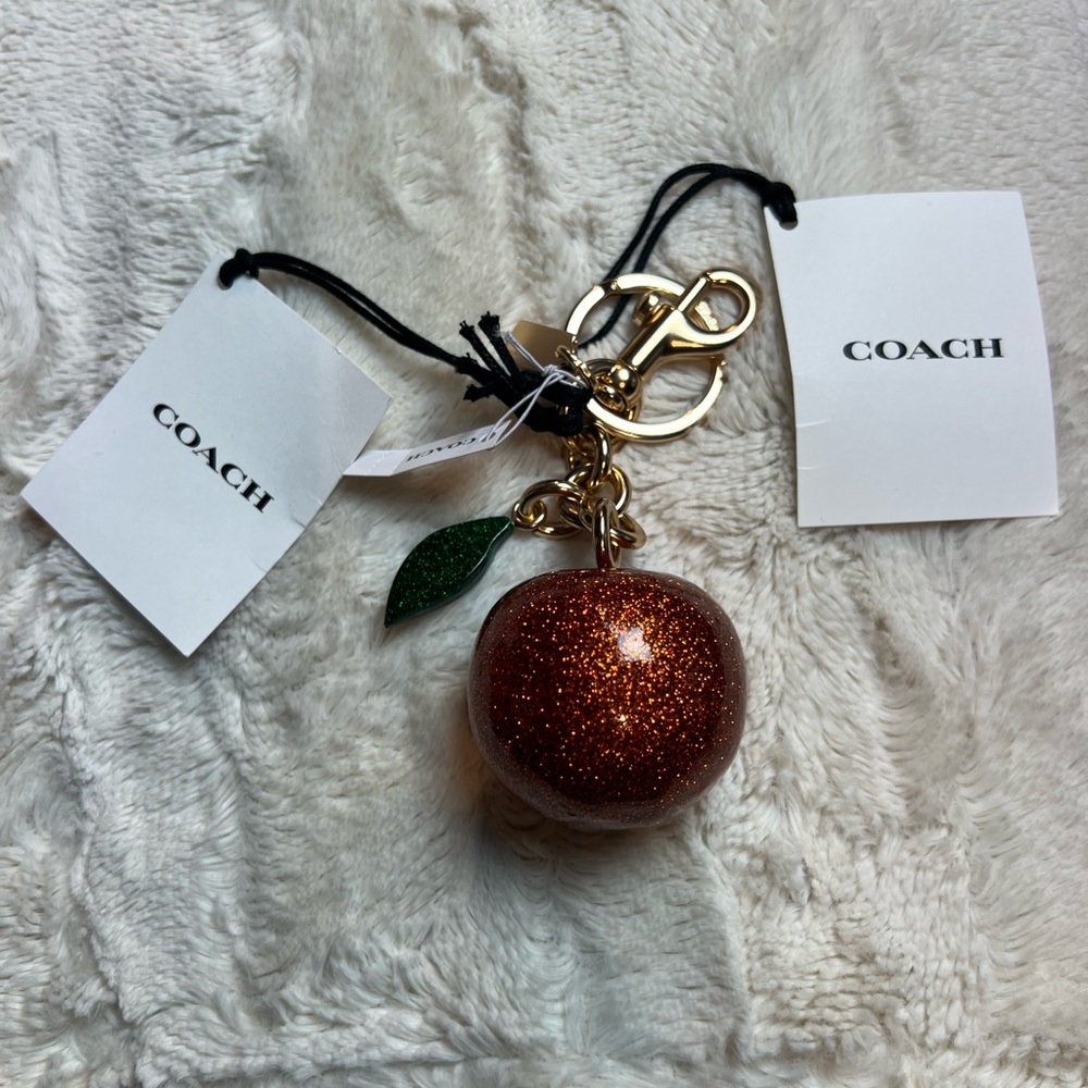 Coach Glitter Orange Keychain Charm in Copper with Green Leaf